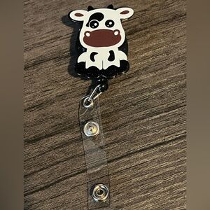 Cow badge reel
